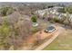 Inviting home featuring a cozy front porch and a newly constructed driveway, situated on a vast property at 818 E Charles St, Matthews, NC 28105