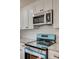 Close up of the kitchen appliances and white subway tile backsplash at 818 E Charles St, Matthews, NC 28105