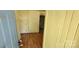 An open living space featuring hardwood floors and a doorway to another room at 819 Circle Vw, Gastonia, NC 28054