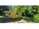 Side view of the house showing the porch and small windows at 819 Circle Vw, Gastonia, NC 28054