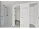 Bathroom features tiled shower and access to walk in closet at 8620 Grey Squirrel Ct, Charlotte, NC 28277