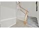 Bright foyer with staircase, tile flooring, and neutral wall colors at 8620 Grey Squirrel Ct, Charlotte, NC 28277