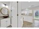 Modern powder room with a stylish vanity and sink at 8620 Grey Squirrel Ct, Charlotte, NC 28277