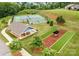 Aerial view of tennis and pickleball courts, bocce ball, and common areas within this community at 8633 Sequoia Grove Ln, Charlotte, NC 28214