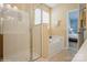 Bathroom featuring both a glass-enclosed shower and a separate soaking tub for relaxation at 8633 Sequoia Grove Ln, Charlotte, NC 28214