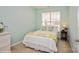 Cozy bedroom with a comfy bed, bright window, side table, and soft carpet at 8633 Sequoia Grove Ln, Charlotte, NC 28214