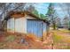 Exterior of a large barn featuring metal siding, a large sliding door, and ample space for storage and projects at 9026 Nc 10 Hwy, Vale, NC 28168