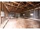 Interior of a large barn featuring a dirt floor, an exposed rafter ceiling, and ample space for storage and projects at 9026 Nc 10 Hwy, Vale, NC 28168