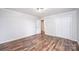 Bedroom features hardwood floors, white walls and trim, a closet, and recessed lighting at 9026 Nc 10 Hwy, Vale, NC 28168