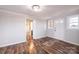 Welcoming entryway boasts wood-look floors, neutral paint, and transitions into adjoining rooms at 9026 Nc 10 Hwy, Vale, NC 28168