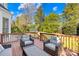 Back deck with outdoor seating, with a peaceful and private backyard at 9433 Gilpatrick Ln, Huntersville, NC 28078