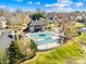 Aerial shot of the community pool and clubhouse, surrounded by well-maintained landscaping and amenities at 9433 Gilpatrick Ln, Huntersville, NC 28078