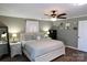 Tranquil bedroom with a ceiling fan, wood floors, and natural light from a large window at 1020 Saint Paul Church Rd, Clover, SC 29710