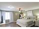 Serene bedroom features hardwood floors, neutral decor, and a large window for natural light at 1020 Saint Paul Church Rd, Clover, SC 29710