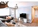 Well-lit living room with a tv, decor and furniture at 1020 Saint Paul Church Rd, Clover, SC 29710