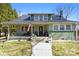 Charming home featuring a covered front porch, American flag, and walkway to the front door at 1025 Old Us 80 Hwy, Gold Hill, NC 28071