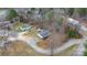 An aerial view of the residence shows its location surrounded by trees and the driveway at 109 Dogwood Dr, Hickory, NC 28601
