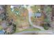 Aerial shot shows the property lines of a home nestled among many trees at 109 Dogwood Dr, Hickory, NC 28601