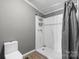 Updated bathroom featuring a tiled shower and modern fixtures at 109 Dogwood Dr, Hickory, NC 28601