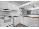 Functional kitchen with white appliances, countertops, and ample cabinet space at 109 Dogwood Dr, Hickory, NC 28601