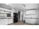 Open kitchen layout with butcher block countertops, modern appliances, and great flow at 109 Dogwood Dr, Hickory, NC 28601