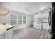 Bright kitchen with white cabinets, modern appliances, and plenty of natural light at 109 Dogwood Dr, Hickory, NC 28601