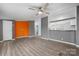 Spacious living room featuring neutral tones, updated flooring, and a modern ceiling fan at 109 Dogwood Dr, Hickory, NC 28601