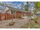 Spacious backyard featuring a brick patio, well-maintained landscaping, and mature trees, ideal for outdoor enjoyment at 1101 Roundknob Ave, Salisbury, NC 28144