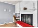 Comfortable office with built-in fireplace, bright lighting, and adjacent cushioned bench at 1101 Roundknob Ave, Salisbury, NC 28144