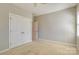 This bedroom is a blank canvas with plush carpet and double closets at 11243 Home Place Ln, Mint Hill, NC 28227