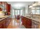 Updated kitchen with granite counters, stainless steel appliances and a breakfast nook bathed in natural light at 11243 Home Place Ln, Mint Hill, NC 28227