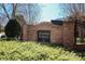 Community entrance to Hidden Forest featuring a brick sign and manicured landscaping at 11243 Home Place Ln, Mint Hill, NC 28227