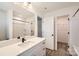 Bathroom with a shower and vanity featuring matte black plumbing at 117 Mountain View St, Gastonia, NC 28052