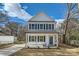 Charming two-story home with a welcoming front porch and a vibrant blue front door at 117 Mountain View St, Gastonia, NC 28052