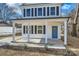 Inviting front porch with classic columns and a blue door, creating a welcoming entrance at 117 Mountain View St, Gastonia, NC 28052