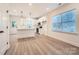 Contemporary kitchen with white cabinets, a breakfast bar, and stainless steel appliances at 117 Mountain View St, Gastonia, NC 28052