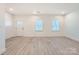Bright and airy living room with clean, minimalist design and modern flooring at 117 Mountain View St, Gastonia, NC 28052