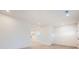 Open living space with recessed lighting, modern flooring, and a view into the stylish kitchen at 117 Mountain View St, Gastonia, NC 28052