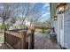 A wooden back deck offers a place to relax, enjoy the sun and grill for your friends and Gathering at 130 N Smallwood Pl, Charlotte, NC 28216