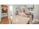Open-concept dining room with hardwood floors, staircase, and natural light at 130 N Smallwood Pl, Charlotte, NC 28216
