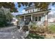 Beautiful two-story house featuring a spacious front porch and well-maintained landscaping at 130 N Smallwood Pl, Charlotte, NC 28216