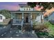 Charming two-story home with a welcoming front porch and landscaped yard in a desirable neighborhood at 130 N Smallwood Pl, Charlotte, NC 28216