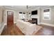 Bright living room featuring hardwood floors, a fireplace, and natural light at 130 N Smallwood Pl, Charlotte, NC 28216
