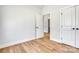 Bedroom with wood-look floors with an open doorway at 1313 Springdale Park Dr, Lincolnton, NC 28092