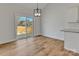 Bright dining area with sliding glass doors leading to an outdoor deck and wooded view at 1313 Springdale Park Dr, Lincolnton, NC 28092