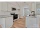 Beautiful kitchen with modern appliances, granite countertops, and white cabinets at 1313 Springdale Park Dr, Lincolnton, NC 28092