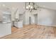 Bright, open-concept living space with vaulted ceilings and modern light fixtures at 1313 Springdale Park Dr, Lincolnton, NC 28092