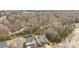 Aerial view of two upscale homes near wooded area, showcasing the neighborhood layout at 13725 Laughing Gull Dr, Charlotte, NC 28278