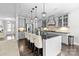 Well-equipped kitchen with a central island, stainless steel appliances, and ample cabinet space at 13725 Laughing Gull Dr, Charlotte, NC 28278