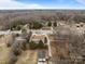 Scenic aerial view of neighborhood homes and the surrounding treeline at 1601 Mooresville Rd, Salisbury, NC 28147